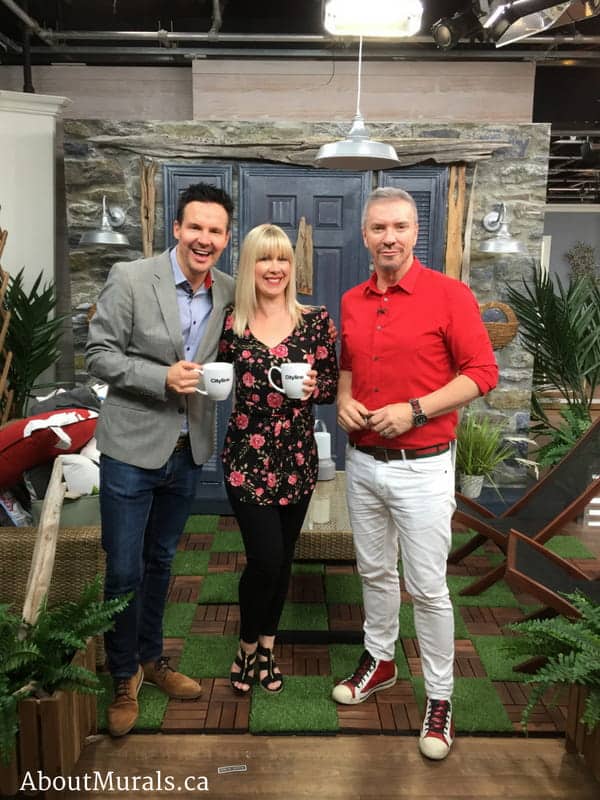 Colin and Justin with Adrienne of AboutMurals.ca in front of her stone wallpaper on Cityline