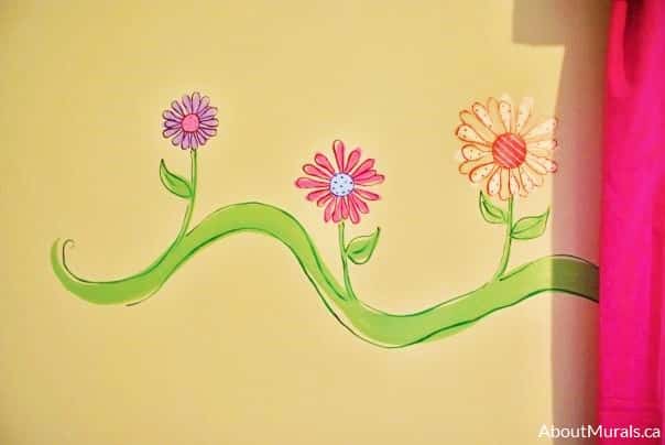 A pink and purple flower mural painted by Adrienne of AboutMurals.ca