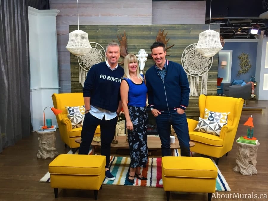 Colin and Justin, with Adrienne of About Murals, in front of a barnwood wallpaper featured on Cityline