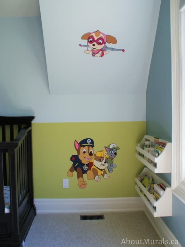 A paw patrol mural featuring Chase, Rubble, Rocky and Skye, painted by Adrienne of AboutMurals.ca