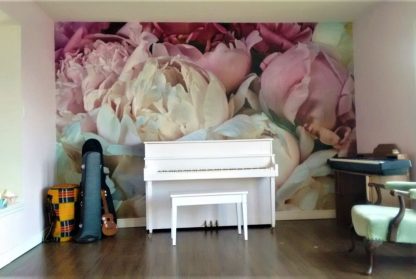 Peony Wallpaper, as seen on the wall of this music room, is a photo mural wallpaper of large pink and white peony flowers from About Murals.