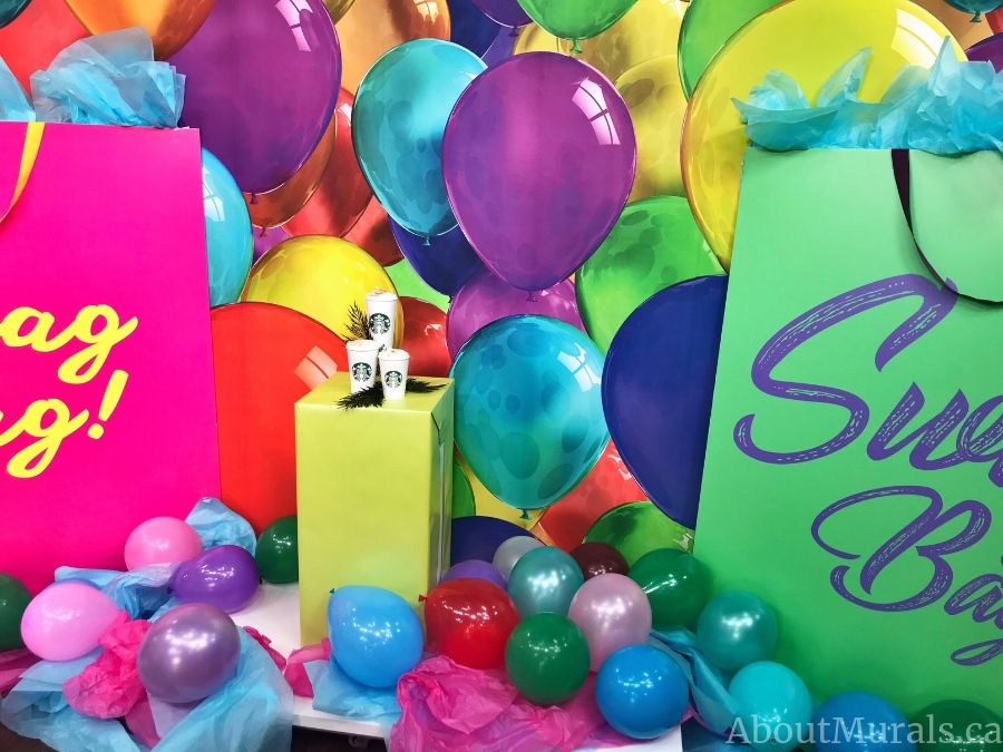 A party room wallpaper with colourful balloons on set at Cityline, installed by AboutMurals.ca