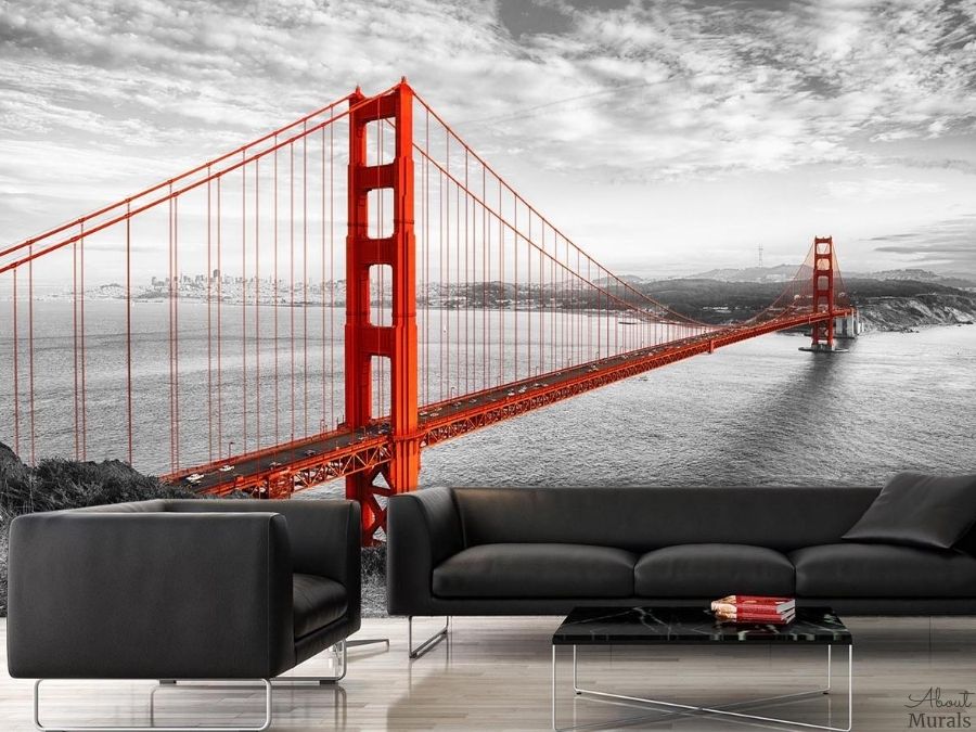 Golden Gate Bridge Wallpaper, as seen on the wall of this living room, features the famous red bridge contrasted against a black and white San Francisco landscape. City wall murals from AboutMurals.ca.
