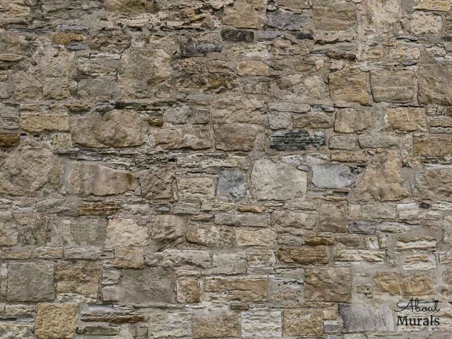 Castle Stone Wallpaper features a wall of rugged, textured brown stones. Stone wall murals from AboutMurals.ca.