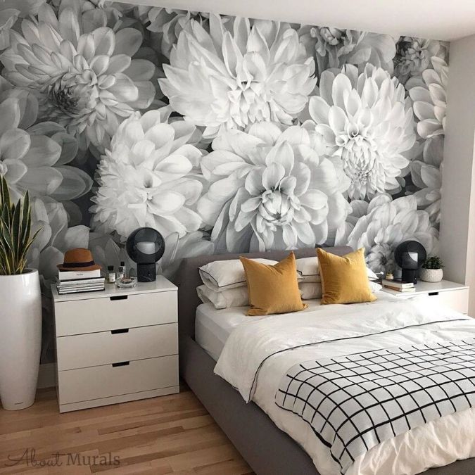 Black and White Flower Wallpaper, as seen on the wall of this master bedroom, creates a beautiful accent wall with its grey dahlia flowers. Floral wallpaper from AboutMurals.ca