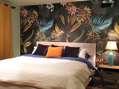 Black Tropical Wallpaper, as seen on this bedroom wall, features exotic flowers, palm leaves, banana leaves and lizards on a dark background. Tropical wallpaper sold by AboutMurals.ca