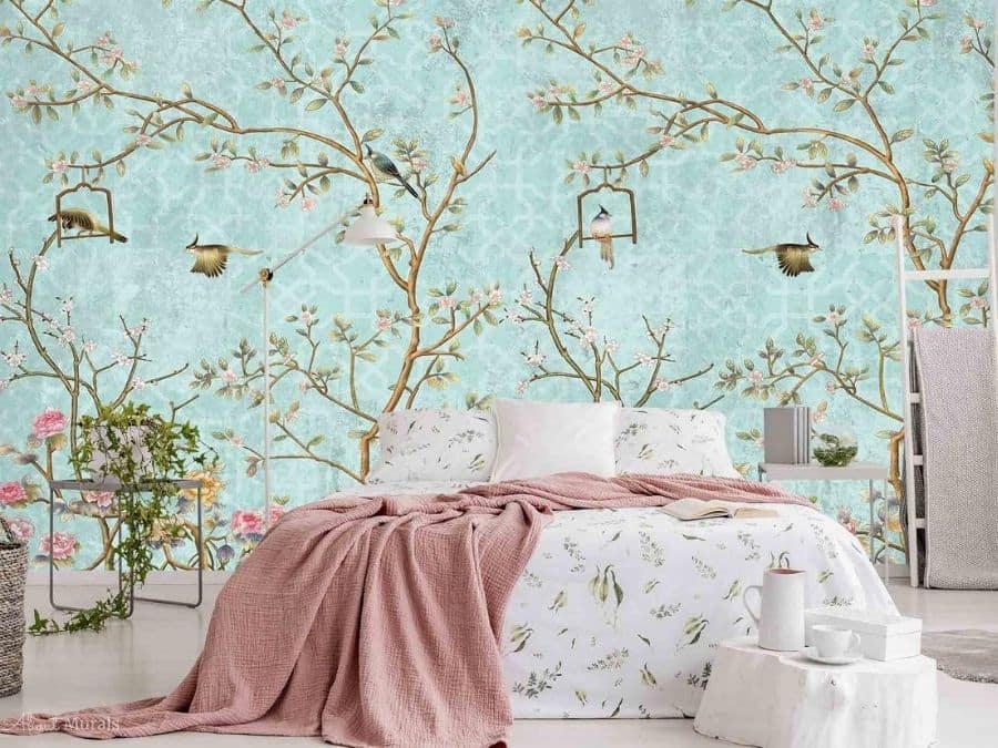 Chinoiserie Wallpaper, as seen on the wall of this elegant bedroom, features birds sitting on flower branches against an aqua blue background. Chinoiserie mural from AboutMurals.ca.