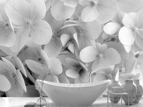 Black and White Hydrangea Wallpaper, as seen on the wall of this bathroom, features a close-up view of delicate flower petals from About Murals.