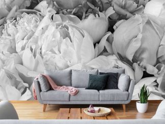 Black and White Peony Wallpaper, as seen on the wall of this living room, features large grey flowers from About Murals.