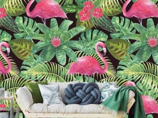 Flamingo Wallpaper, as seen on the wall of this living room, features pink flamingos, palm leaves, monstera leaves, hibiscus flowers or a black background from About Murals.