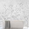 Grey Leaf Wallpaper, as seen on the wall of this bathroom, features tall, leafy plants with a canvas background from About Murals.