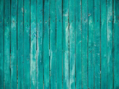 Turquoise Wood Wallpaper is a photo mural of distressed blue green barn wood from About Murals.