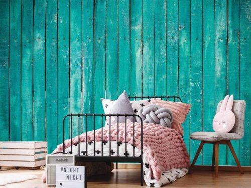 Turquoise Wood Wallpaper, as seen on the wall of this bedroom, features rustic wooden planks in an aqua colour from About Murals.