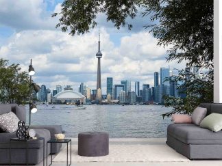 Toronto Wallpaper, as seen on the wall of this living room, features skyline views of skyscrapers, the CN Tower and The Rogers Centre reflected in Lake Ontario from About Murals.