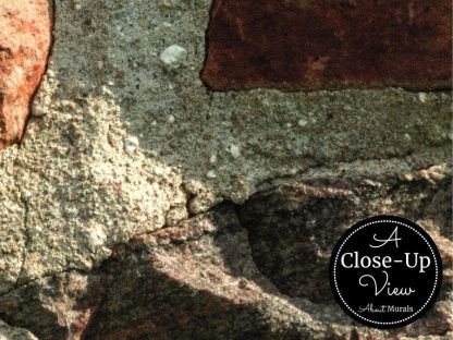 A close-up view of rocks surrounded by mortar in a field stone wallpaper sold by About Murals.