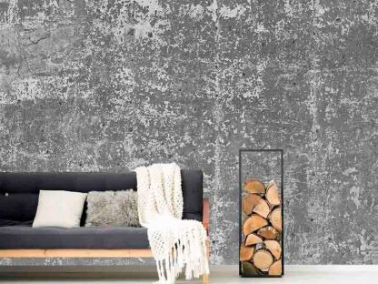 Cement Wallpaper, as seen on the wall of this living room, is a photo wallpaper of a decaying, texture concrete wall from About Murals.