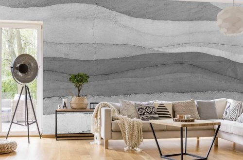 Concrete Effect Wallpaper, as seen on the wall of this living room, is a photo mural with horizontal layers of concrete from About Murals.
