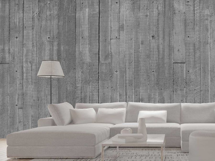 Concrete Look Wallpaper, as seen on the wall of this white living room, is a photo mural of concrete planks from About Murals.