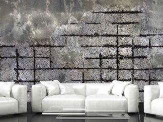 Dark Concrete Wallpaper, as seen in this living room, is a photo mural of black, rusted rebar and cement parging over a concrete wall from About Murals.