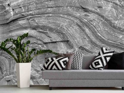 Gray Rock Wallpaper, as seen on the wall of this living room, is a photo mural of the Canadian shield rock face wall from About Murals.
