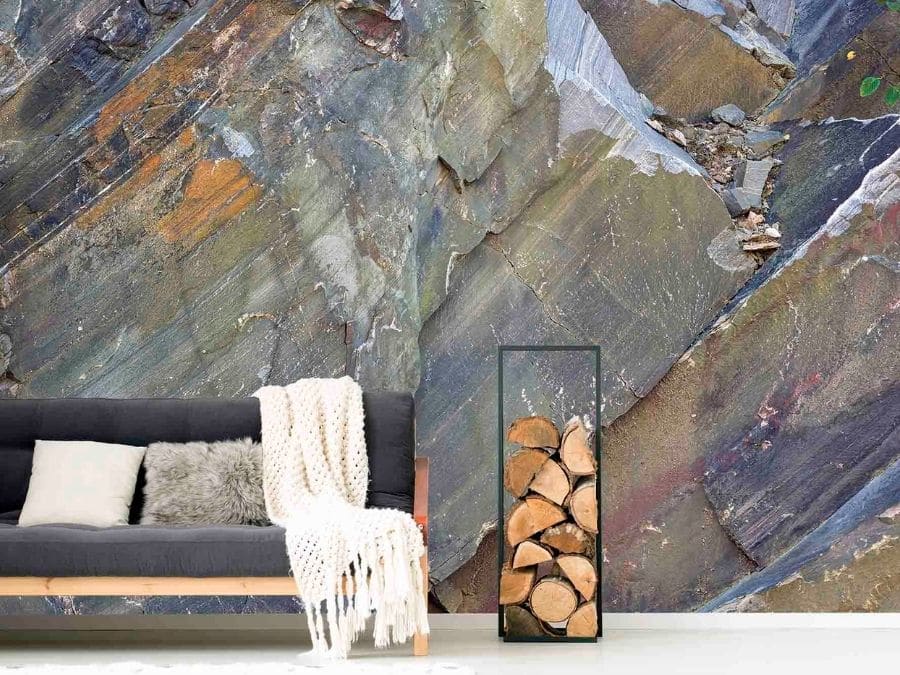 Rock Texture Wallpaper, as seen on the wall of this living room, is a photo mural of a rock face cliff wall from About Murals.