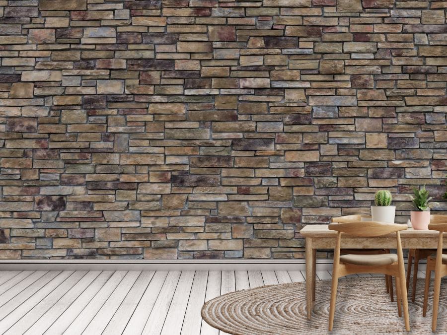 Stacked Stone Wallpaper, as seen on the wall of this kitchen, is a high res photo wall mural of brown and grey stones that creates a rustic feeling from About Murals.