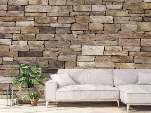 Stone Look Wallpaper, as seen on this living room wall, is a photo mural of beige stacked stones from About Murals.