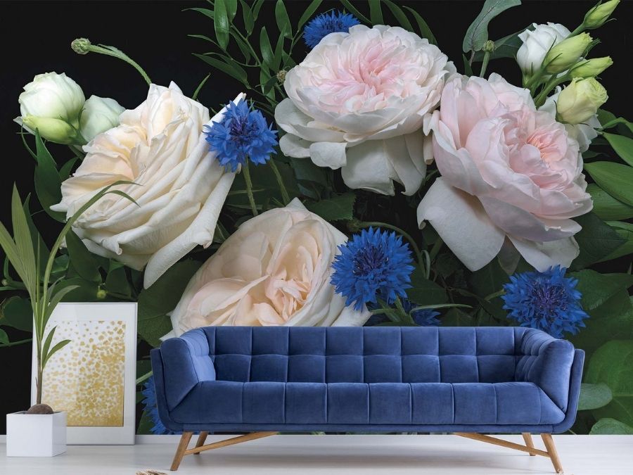 Black and Pink Rose Wallpaper, as seen on the wall of this living room, is a dark floral mural with pink and white roses, blue cornflowers and green leaves on a black background from About Murals.