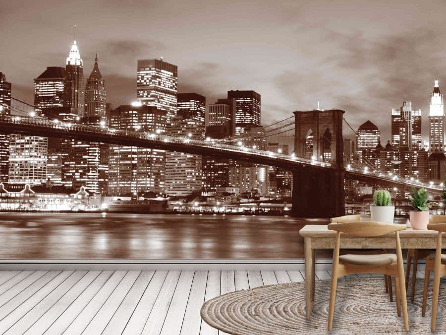 Brooklyn Bridge Park Wallpaper, as seen on the wall of this kitchen, is a realistic photo wall mural of the New York City skyline full of skyscrapers and buildings under a brown night sky from About Murals.