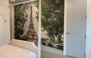 Eiffel Tower Wallpaper, as seen on the wall of this girls bedroom, is a photo mural of the famous tourist attraction overlooking the River Seine in Paris, France from About Murals.