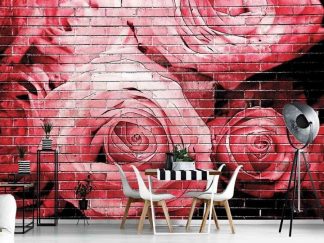Graffiti Flower Wallpaper, as seen on the wall of this kids room, features pink and red painted roses on a black brick wall from About Murals.