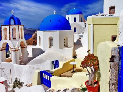 Greece Wallpaper is a photo mural celebrating the blue and white colors of Santorini from About Murals.