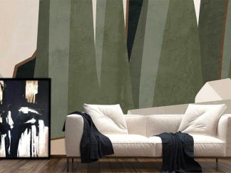 Green Abstract Wallpaper, as seen on the wall of this living room, features a geometric forest among rugged rocks from About Murals.