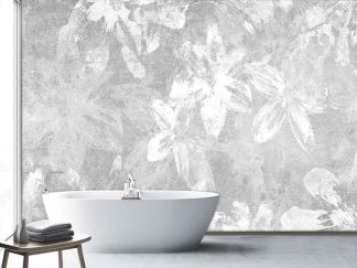 Grey and White Floral Wallpaper, as seen on the wall of this bathroom, features abstract, simple white flowers painted on a concrete wall from About Murals.