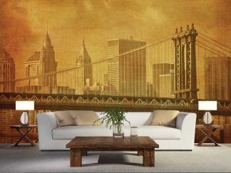 New York Vintage Wallpaper, as seen on the wall of this living room, is a sepia photo mural of the Brooklyn Bridge in New York City from About Murals.