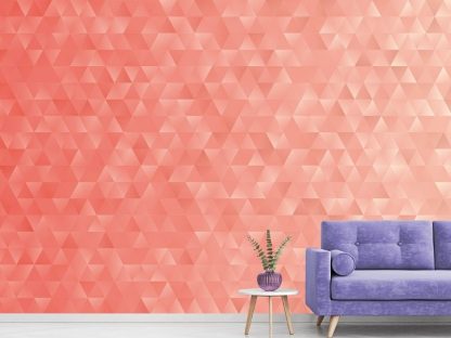 Pink Triangle Wallpaper, as seen on the wall of this living room, features stacked triangles that make a diamond shape in light and dark pink, making it look 3D from About Murals.