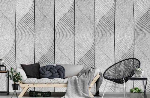 Scandi Leaf Wallpaper, as seen on the wall of this living room, features simple leaves raked into grey sand from About Murals.