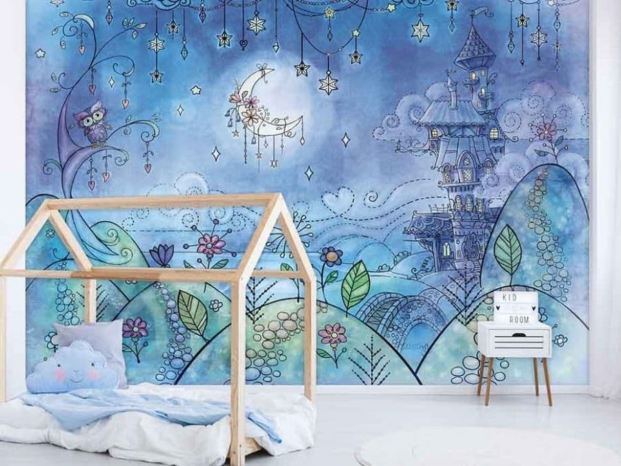 Bedtime Wallpaper, as seen on the wall of this kids bedroom, is a mural with a moon, stars, hearts and flowers surrounding a sleepy castle from About Murals.