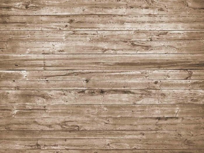 Brown Wood Wallpaper is a photo mural of a horizontal old barn wood brown wallpaper from About Murals.