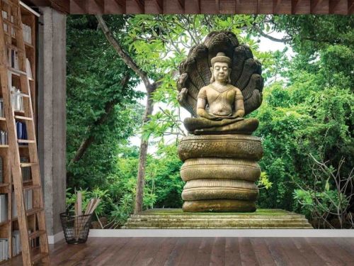 Buddha Wallpaper, as seen on the wall of this meditation room, is a photo mural of a Buddha statue in a forest protected by nine snakes from About Murals.