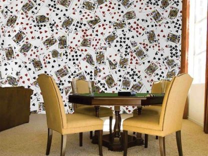 Cards Wallpaper, as seen on the wall of this games room, is a photo mural of the face of playing cards with their heart, diamond, spade and club suits from About Murals.