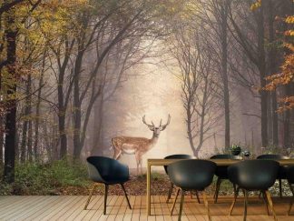 Deer Wallpaper, as seen on the wall of this hunting room, features a fallow deer in an autumn forest from About Murals.