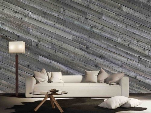 Diagonal Wood Wallpaper, as seen on the wall of this living room, is a high resolution photo mural of grey wood paneling from About Murals.