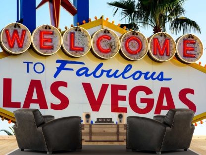 Las Vegas Wallpaper, as seen on the wall of this man cave, is a photo mural of the Las Vegas sign from About Murals.