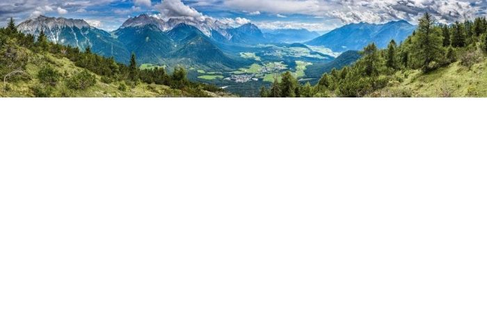 Mountain Forest Wallpaper is a panoramic photo mural of the Austrian Alps near Innsbruck from About Murals.