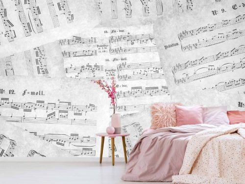 Music Note Wallpaper, as seen on the wall of this music themed bedroom, is a mural of a collage of black and white music sheets with ledger lines, clef and music notes from About Murals.