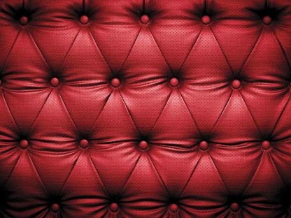 Red Leather Wallpaper is a wall mural of padded leather with buttons from About Murals.