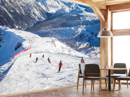 Whistler Ski Wallpaper, as seen on the wall of this mountain themed restaurant, is a photo mural of skiiers on Whistler mountain in British Columbia, Canada from About Murals.