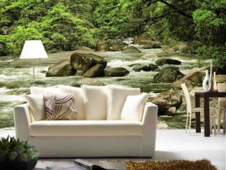 Stream Wallpaper, as seen on the wall of this living room, is a photo mural of a river gushing over rocks in an Australian forest from About Murals.
