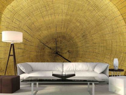 Wood Slice Wallpaper, as seen on the wall of this living room, is a photo mural of a cut log showing the texture from the annual rings and cracks from About Murals.
